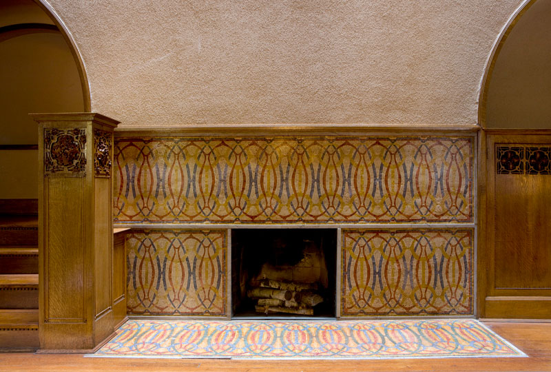 fireplace with mosaic surround