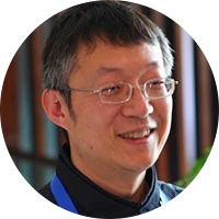 Shuishan Yu, a Chinese man with short black hair, wears glasses and a dark shirt