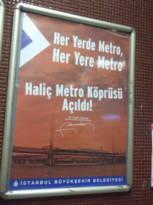 Sign advertising the opening of the Haliç Metro Bridge.