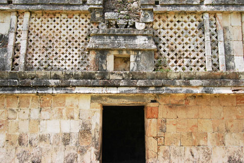Thatched roof house seen in stone carvings at Uxmal.