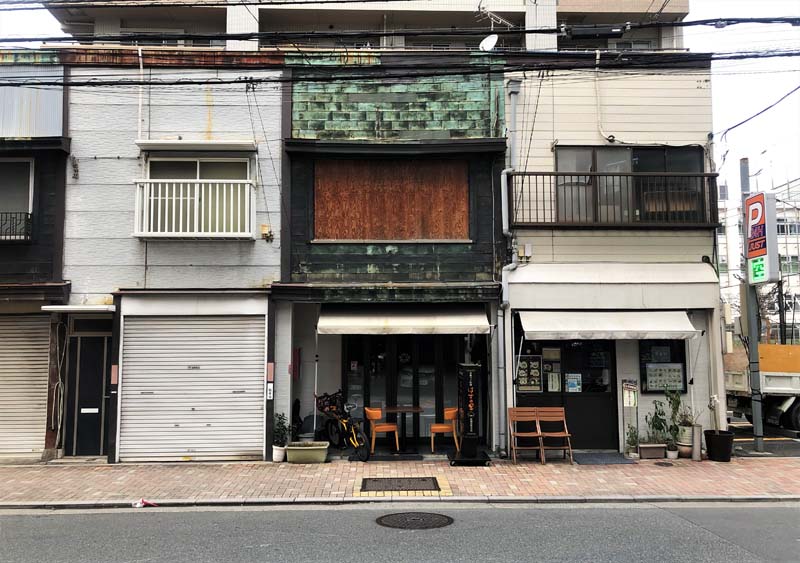 building facade with awnings and balconies