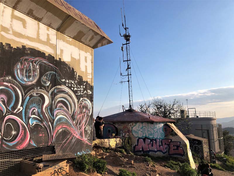 concrete bunkers covered in graffiti