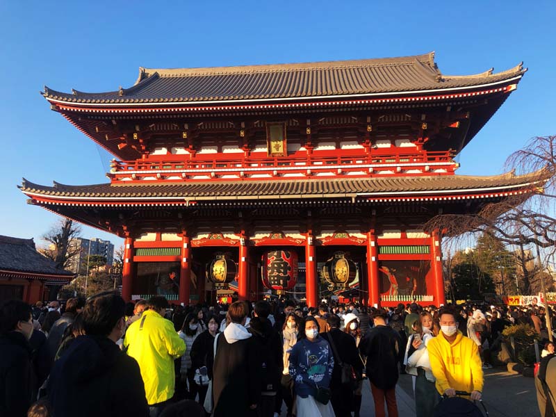 crowd of people outside temple