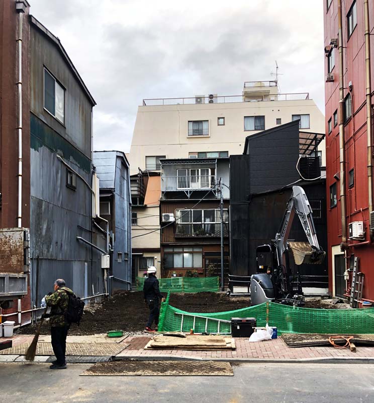 construction site between two buildings