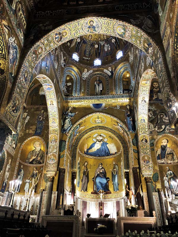 view up into apses and dome covered in Byzantine mosaics