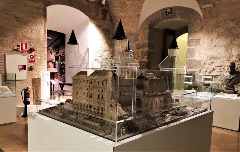 another view of glass model with ruins, museum exhibits in background
