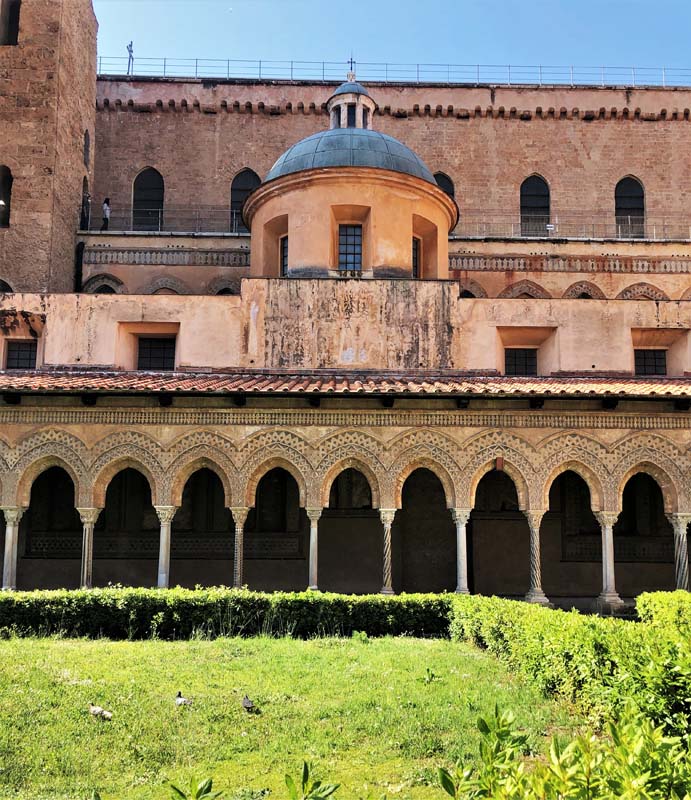 view of arched colonnade and dome