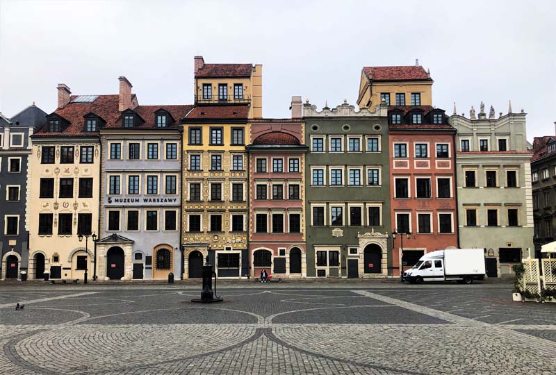 plaza with colorful building facades