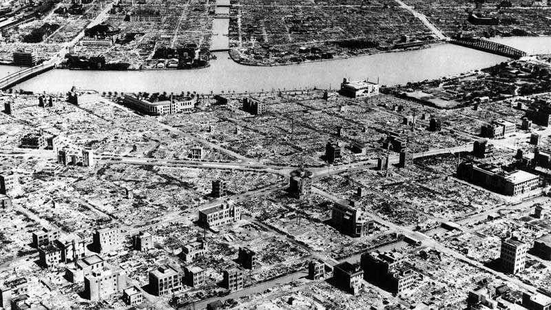 black and white aerial photo of destroyed city