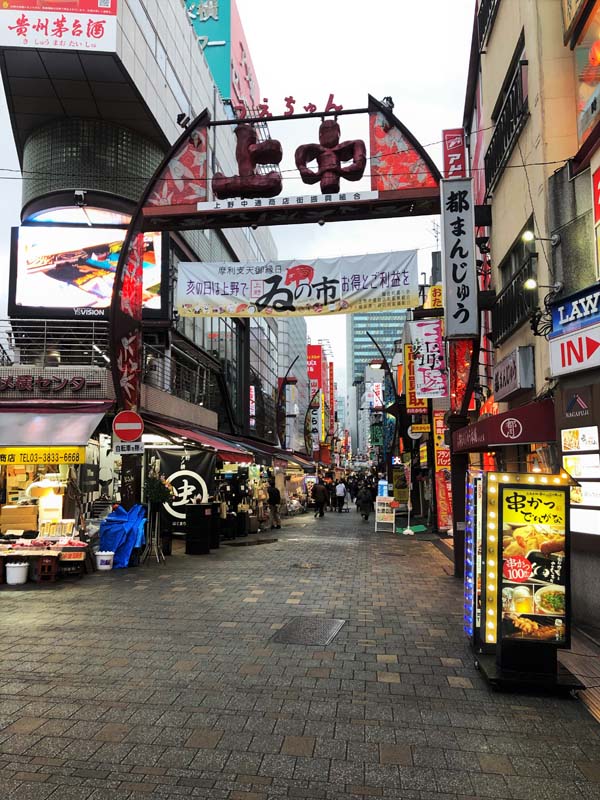 view down street with shops on either side