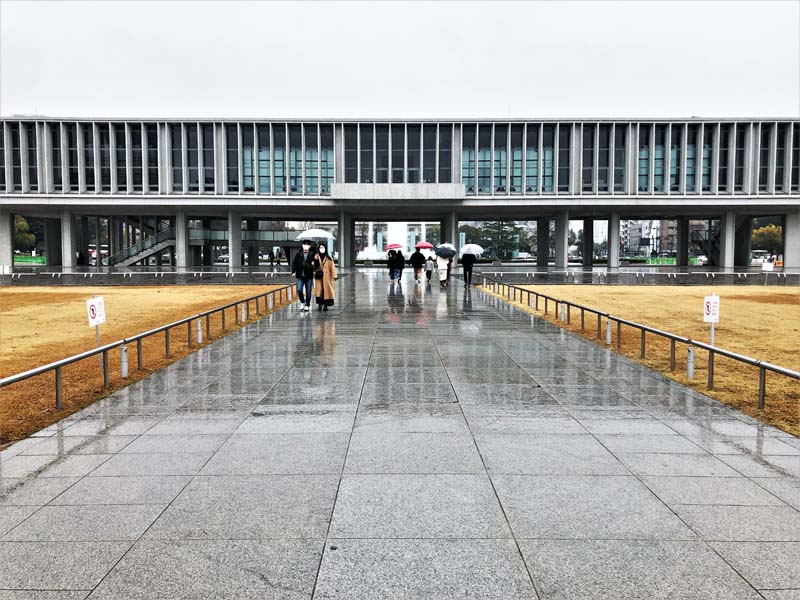 people walking with umbrellas