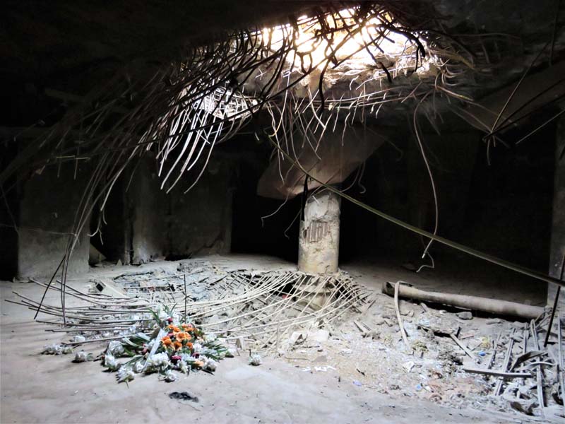 hole in reinforced concrete ceiling with sunlight coming through