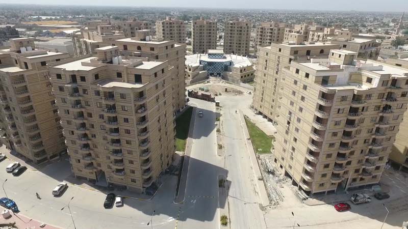 aerial view of multiple high-rise apartments 