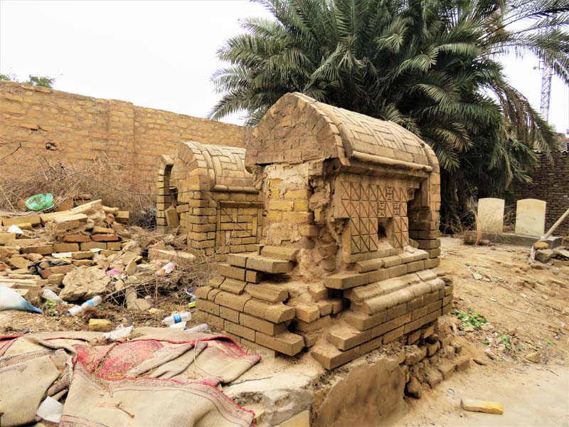 crumbling headstones made of brick