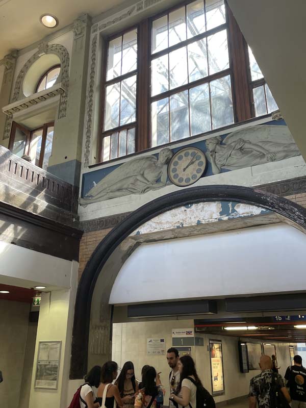 train station clock and arch