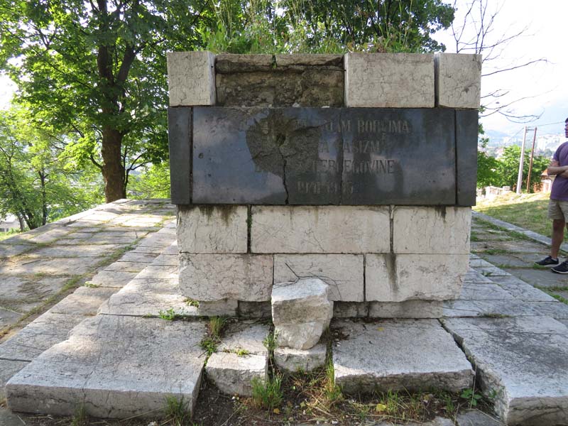 deteriorated stone marker