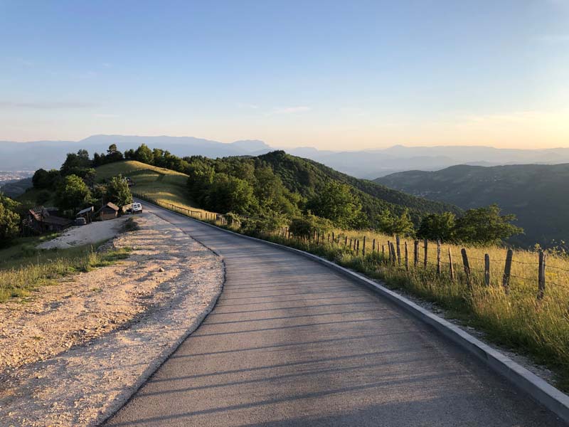 country road with hills in distance