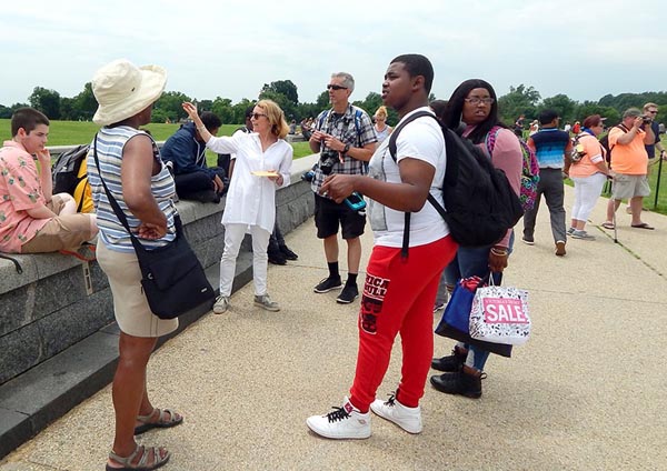 Beth Meyer addresses group near the National Monument Beth Meyer addresses group near the National Monument
