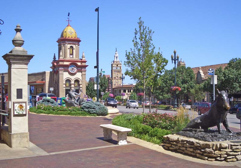 landscaped plaza with buildings in background