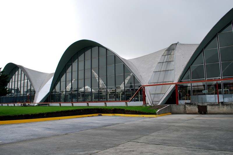 concrete and glass building with domes