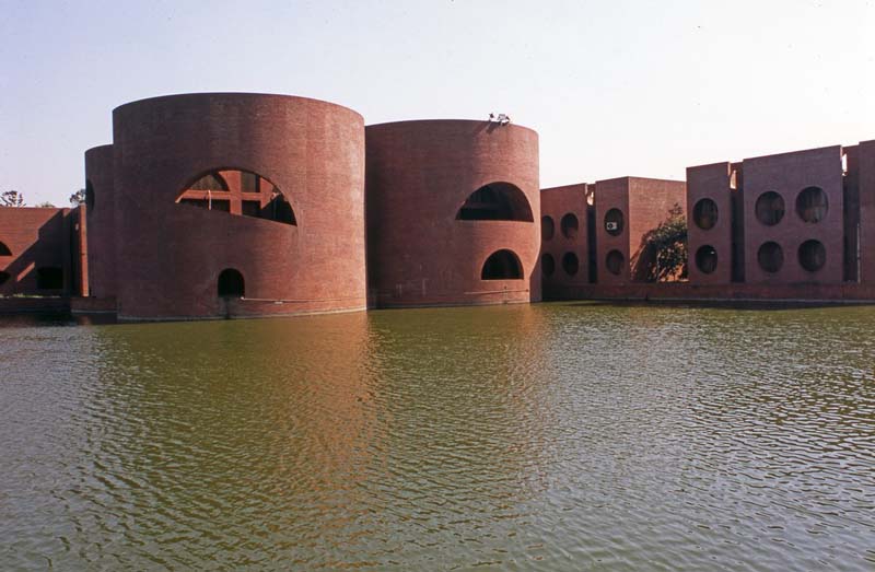 cylindrical buildings with arched cutouts