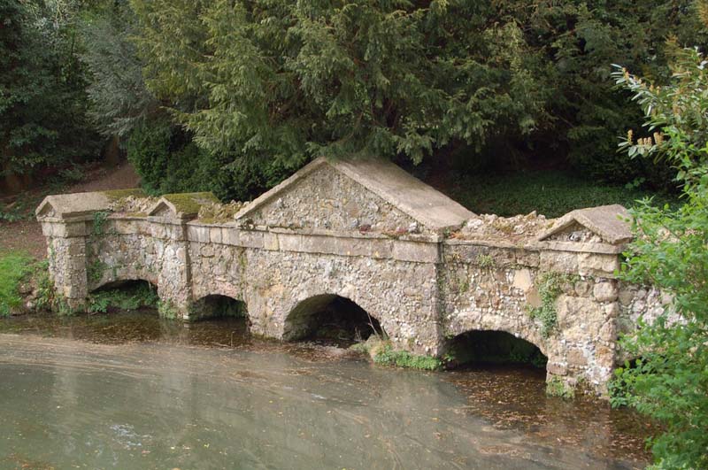 old stone dam and bridge