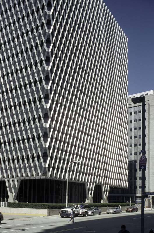highrise building with stainless steel lattice work facade