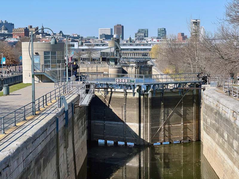 canal and lock with skyline in background