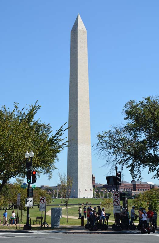 The Washington Monument stands in the National Mall on a clear day