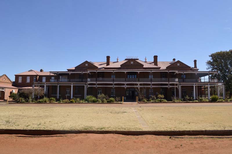 Hotel Belgrave a wide building with hipped roofs and gables