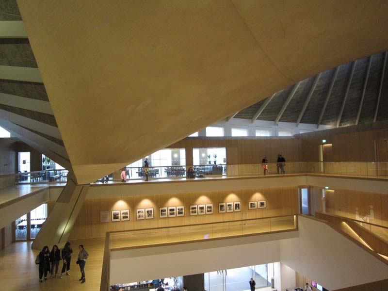museum interior with multiple levels and angular roof